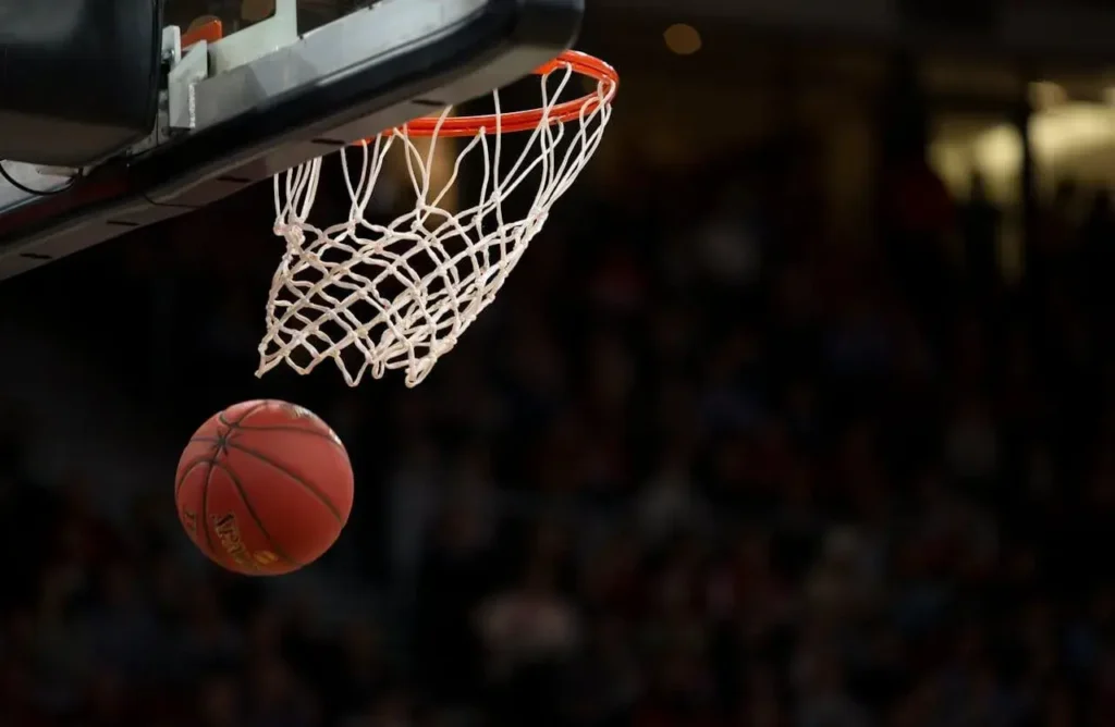 A basketball near a net
